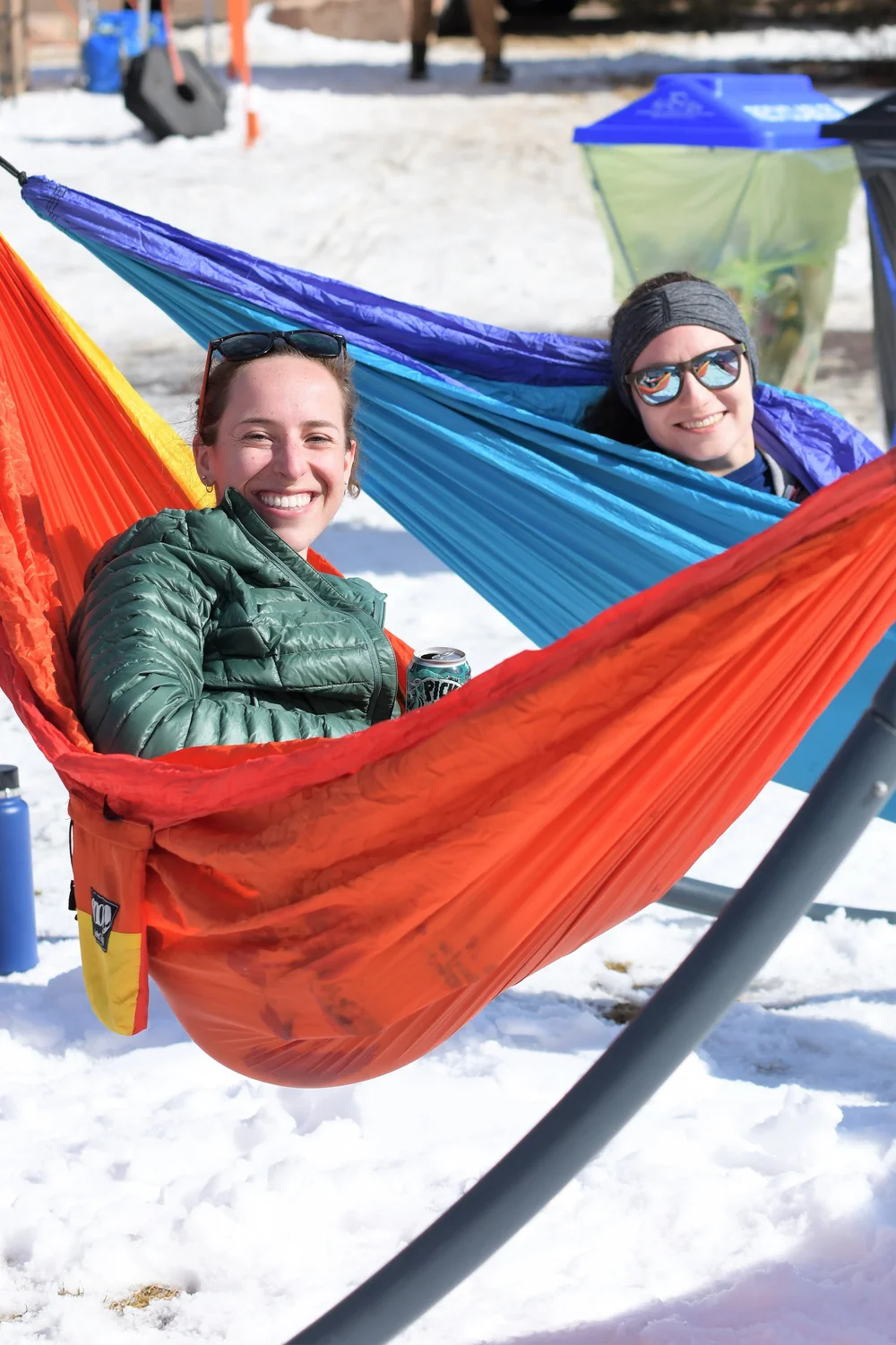 Participants relaxing in hammocks in the snow